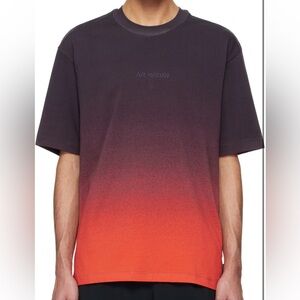 Dak Prescott Owned Nike Jordan Purple & Orange Air Jordan T-shirt
Size- Men’s XL